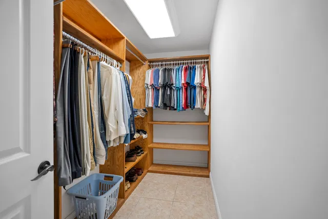 a view of a hallway with closet