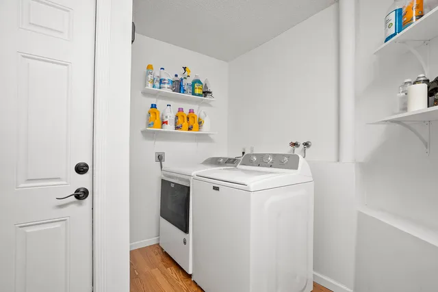 a utility room with washer and dryer