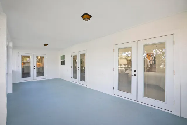 an empty room with windows