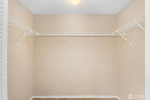 a view of a room with racks on the wall