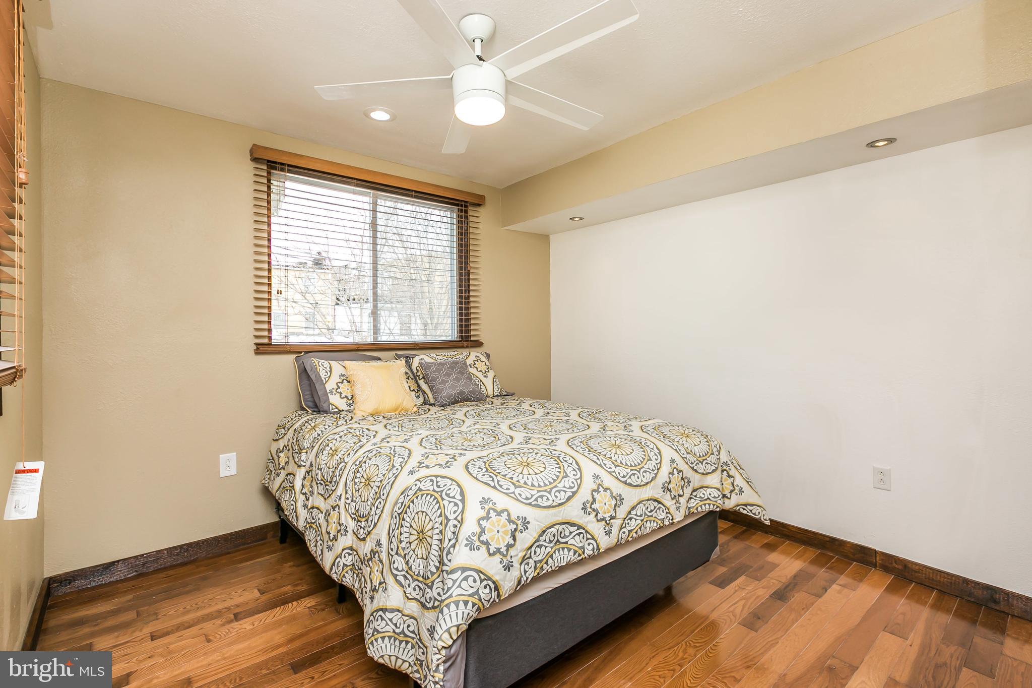 609 Wyeth Street Baltimore, MD 21230 - Photo 11 of 32 a bedroom with a bed and window