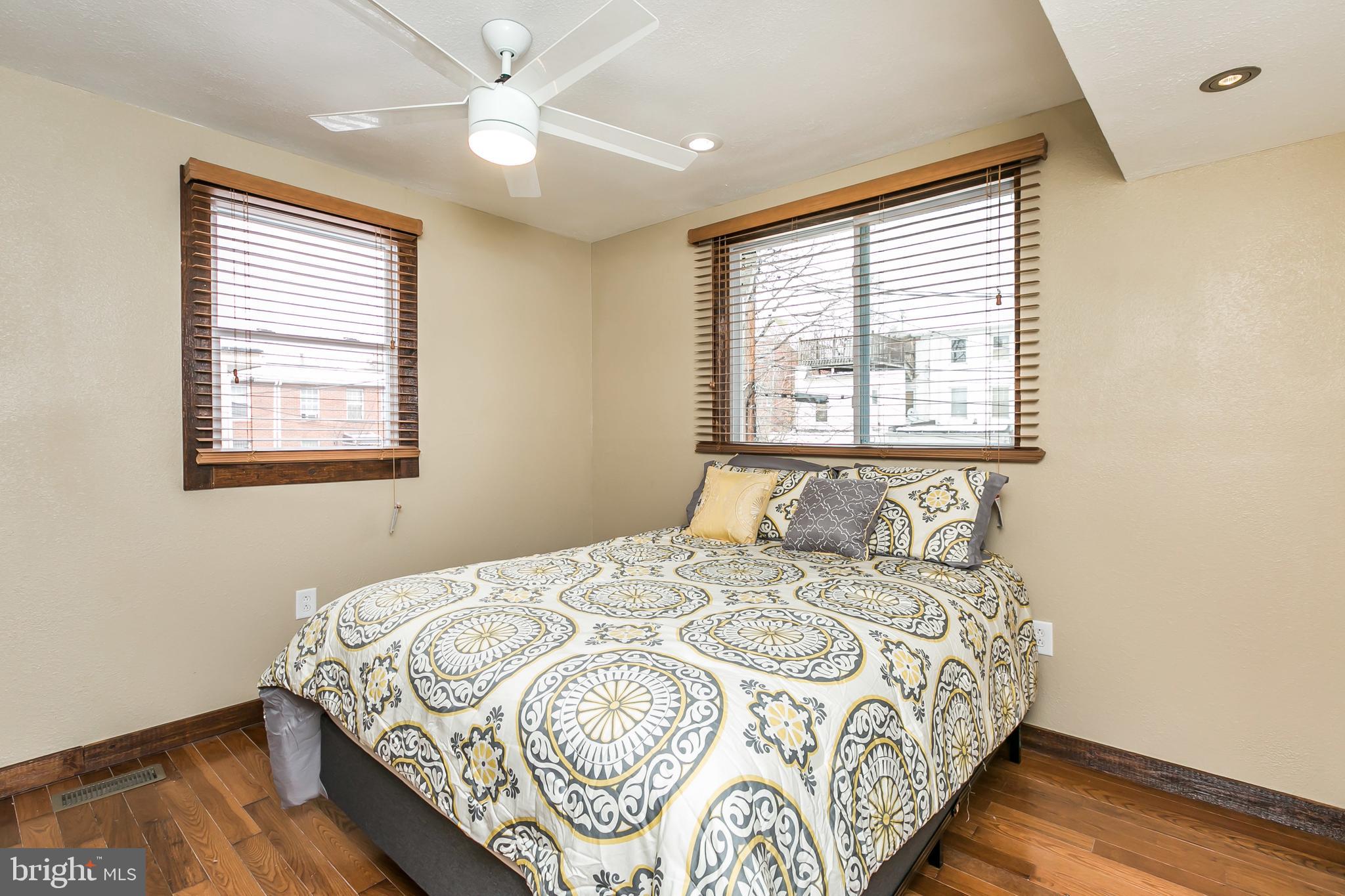 609 Wyeth Street Baltimore, MD 21230 - Photo 12 of 32 a bedroom with a bed and a window
