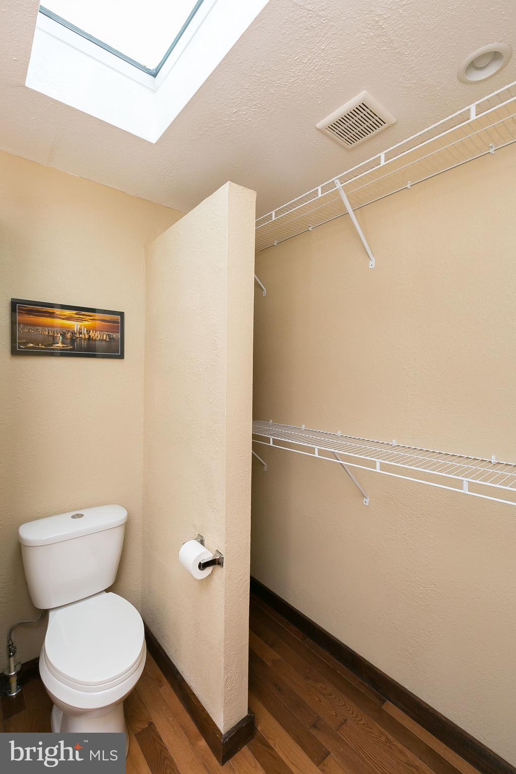 609 Wyeth Street Baltimore, MD 21230 - Photo 13 of 32 a bathroom with a toilet and a shower