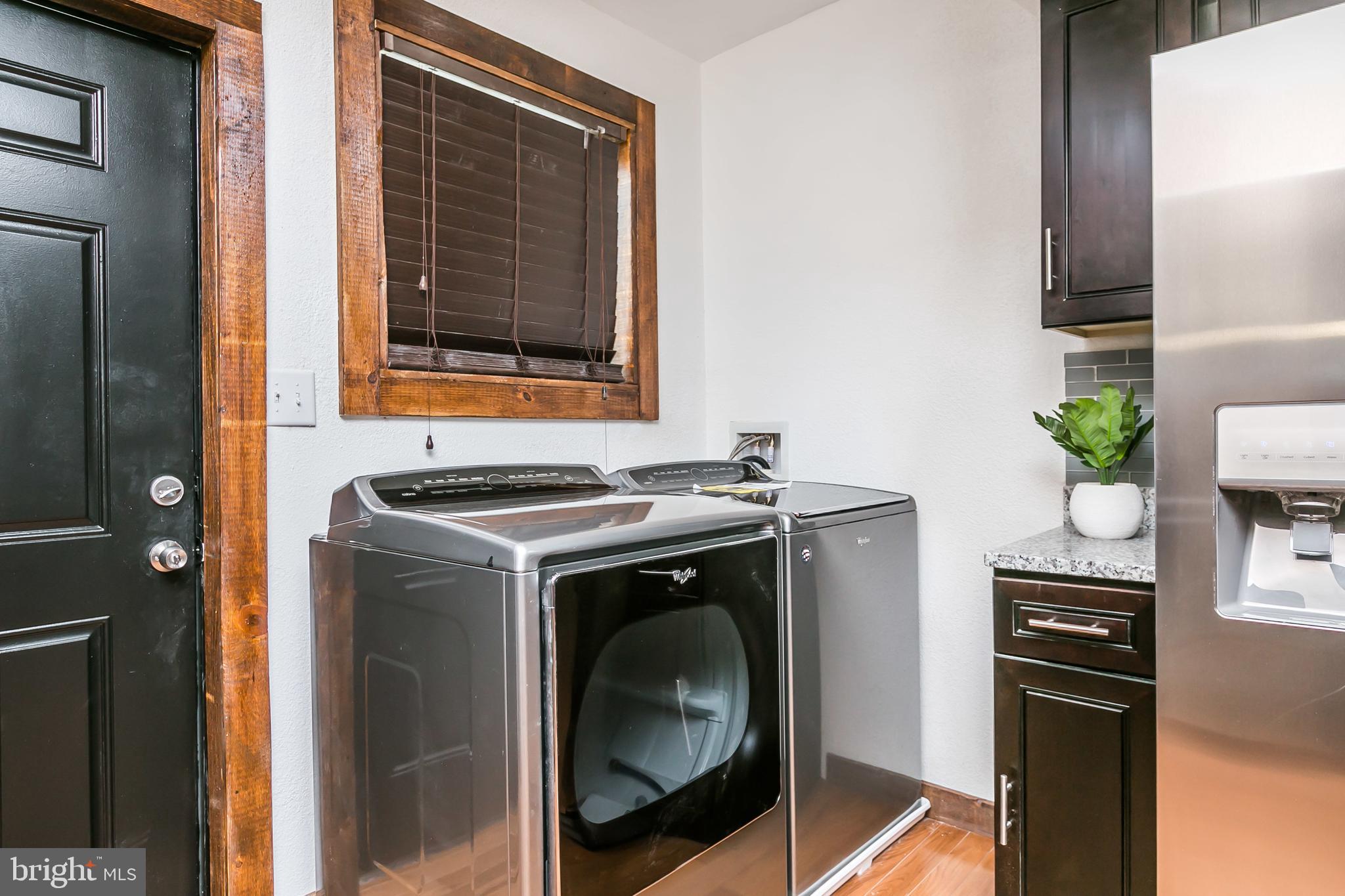 609 Wyeth Street Baltimore, MD 21230 - Photo 10 of 32 a utility room with dryer and washer