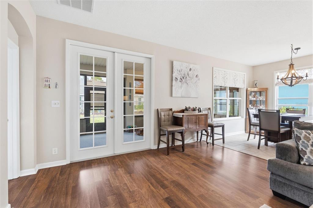 207 Coleton Lane DeLand, FL 32724 - Photo 14 of 65 a view of a livingroom with furniture window and wooden floor