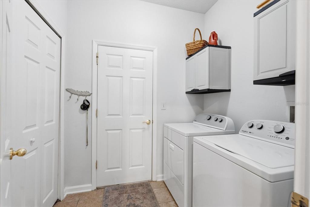 207 Coleton Lane DeLand, FL 32724 - Photo 28 of 65 a utility room with dryer and washer