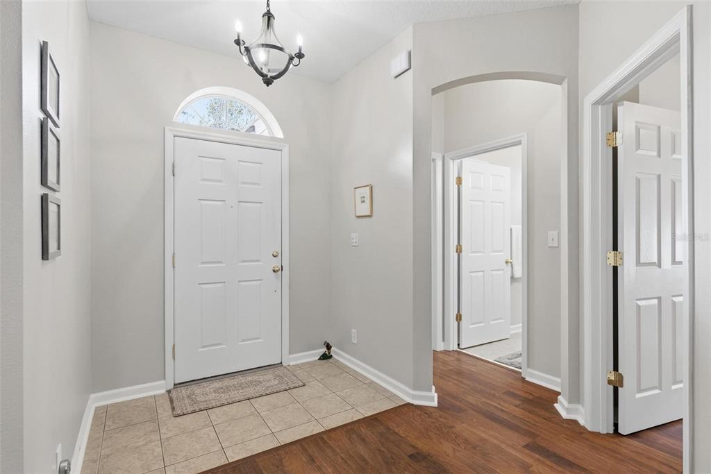 207 Coleton Lane DeLand, FL 32724 - Photo 41 of 65 a view of an empty room with wooden floor
