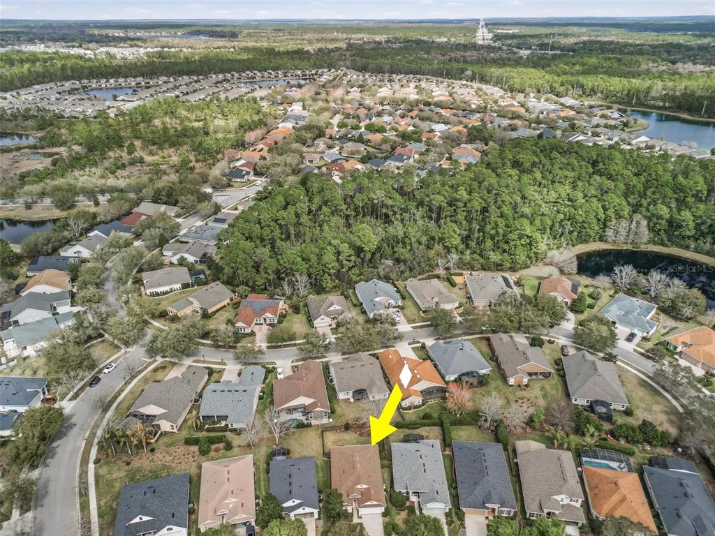 207 Coleton Lane DeLand, FL 32724 - Photo 60 of 65 an aerial view of residential building with outdoor space and seating