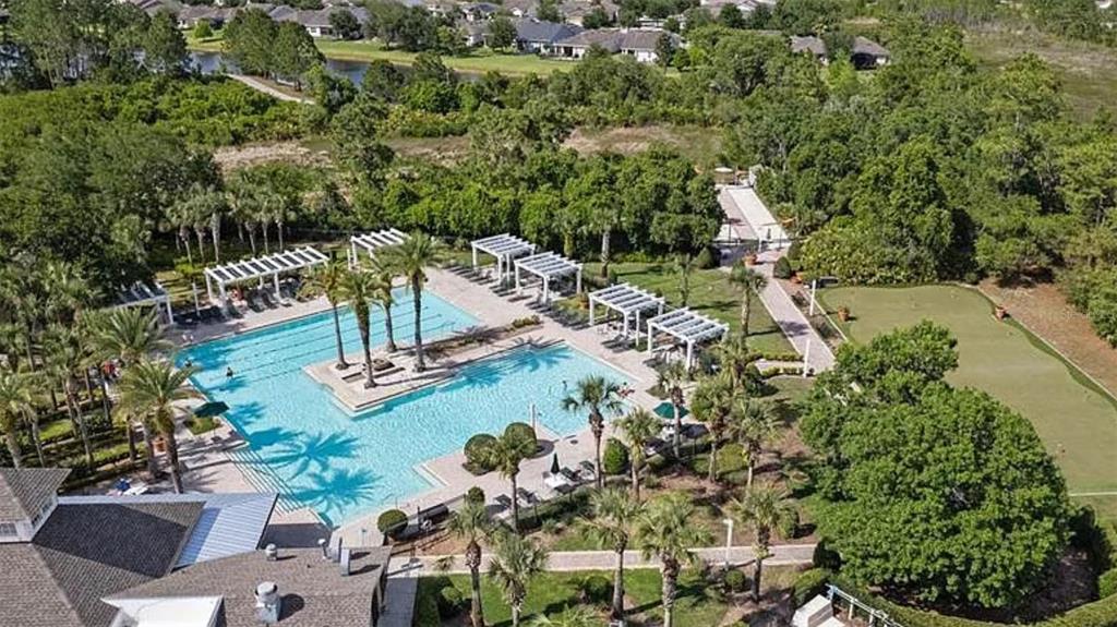 207 Coleton Lane DeLand, FL 32724 - Photo 65 of 65 an aerial view of a house with a yard basket ball court and outdoor seating