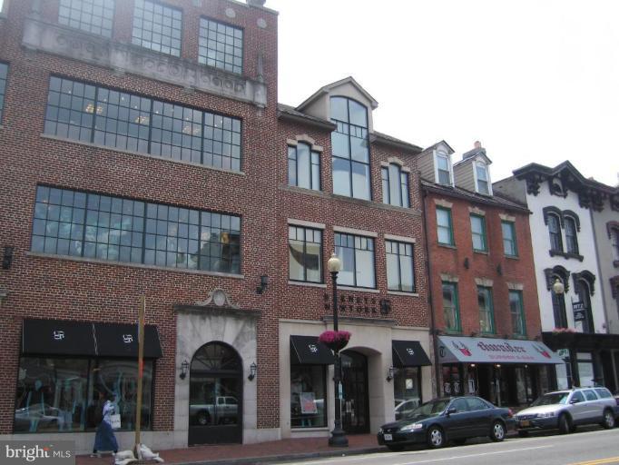 1077 30th Street Northwest, Unit 304 Washington, DC 20007 - Photo 20 of 27 a front view of a building with street