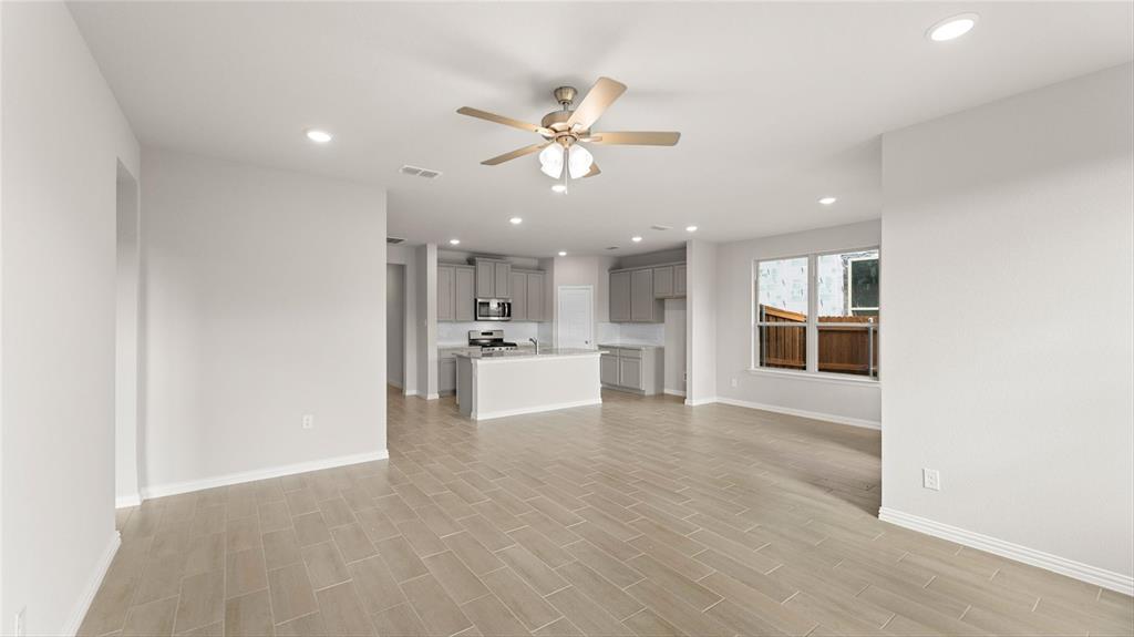 348 Deer Rdg Drive Aledo, TX 76008 - Photo 5 of 15 a view of a kitchen with a sink and cabinet