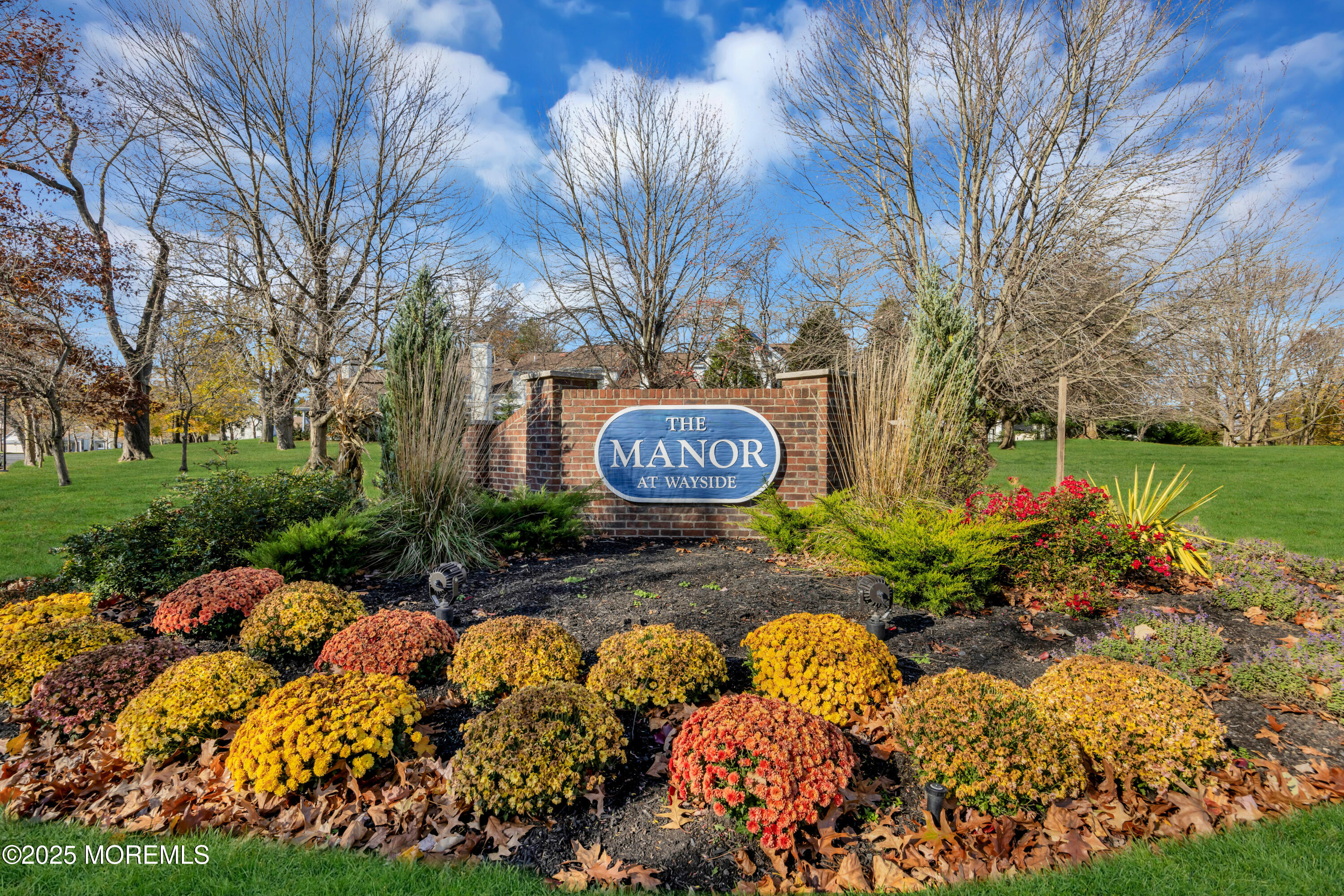 a view of a sign board with yard
