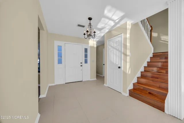 a view of a hallway with entryway