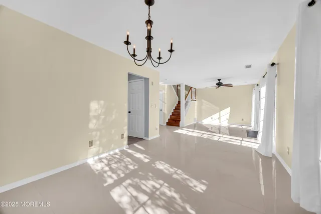a view of a livingroom with wooden floor