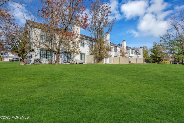 a view of building with yard