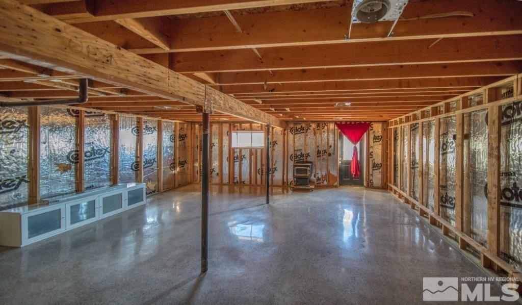 1230 Bullion Hill Road Reno, NV 89508 - Photo 11 of 26 a view of empty room with wooden floor