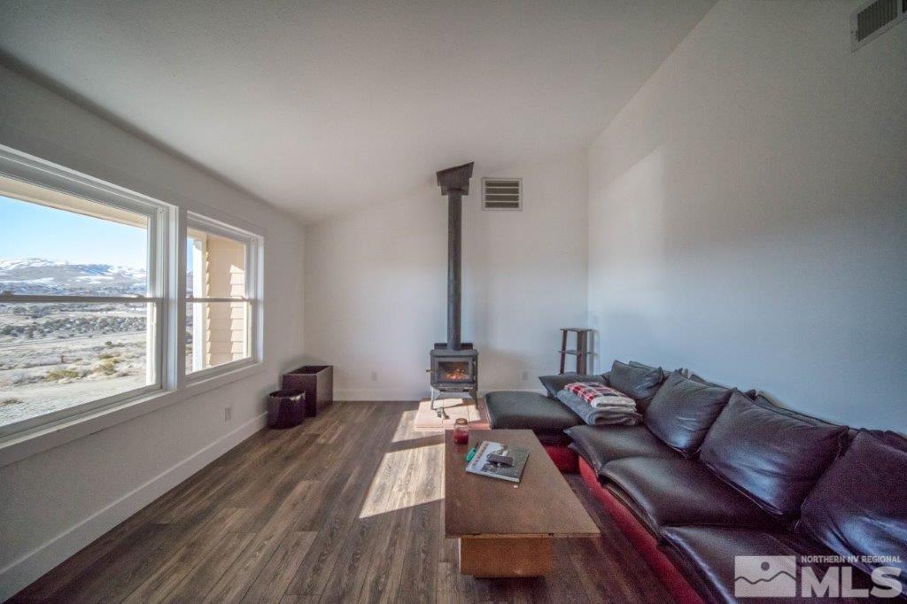 1230 Bullion Hill Road Reno, NV 89508 - Photo 4 of 26 a living room with furniture and a large window
