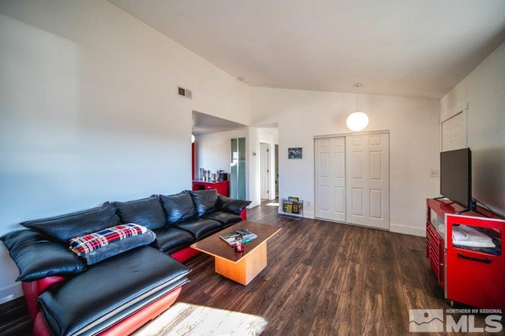 1230 Bullion Hill Road Reno, NV 89508 - Photo 5 of 26 a living room with furniture and a flat screen tv