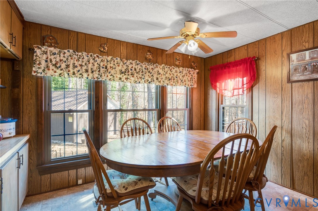 475 Dove Road Boydton, VA 23917 - Photo 9 of 45 a view of a dining room with furniture window and wooden floor