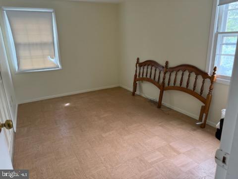 12206 Maycheck Lane Bowie, MD 20715 - Photo 11 of 19 a view of a room with windows