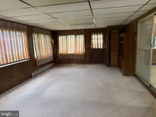 12206 Maycheck Lane Bowie, MD 20715 - Photo 14 of 19 a view of an empty room with a window