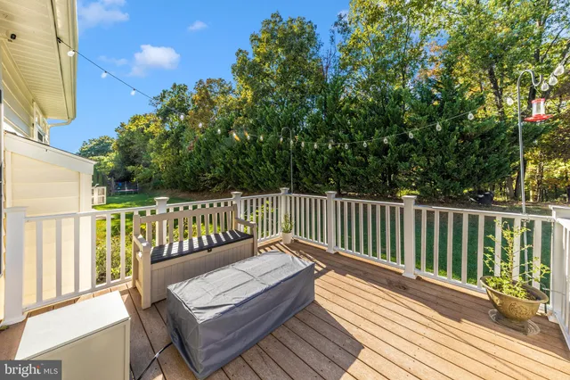 a view of a wooden bench on a deck