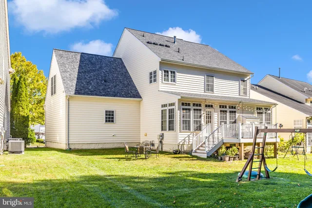 a view of a house with a swimming pool