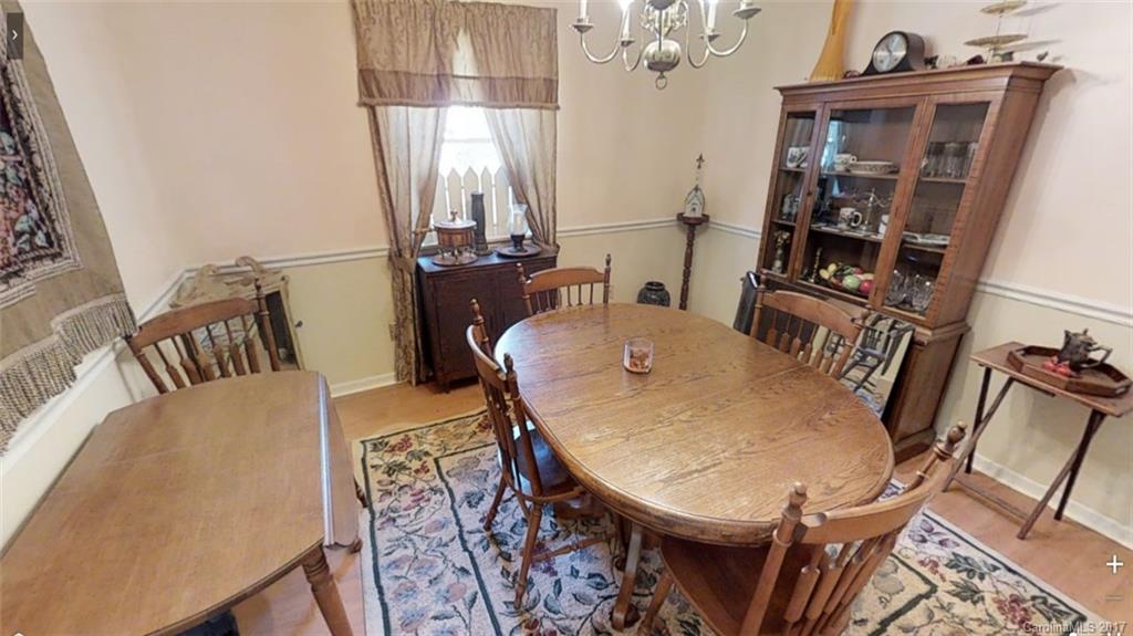 1606 Windsong Forest Road Clover, SC 29710 - Photo 13 of 15 a view of a dining room with furniture