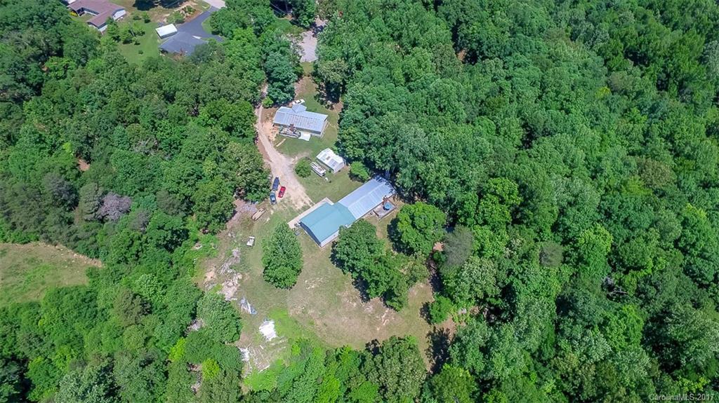 1606 Windsong Forest Road Clover, SC 29710 - Photo 7 of 15 an aerial view of residential house with outdoor space and trees all around