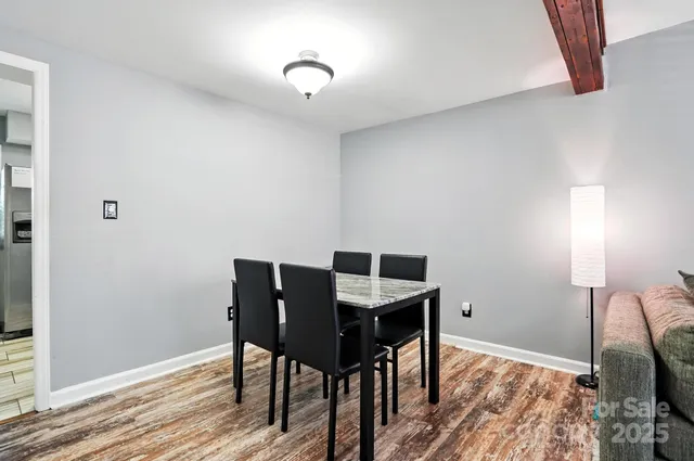 a workspace with furniture and wooden floor