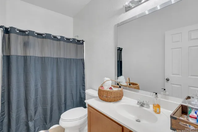 a bathroom with a sink and a toilet