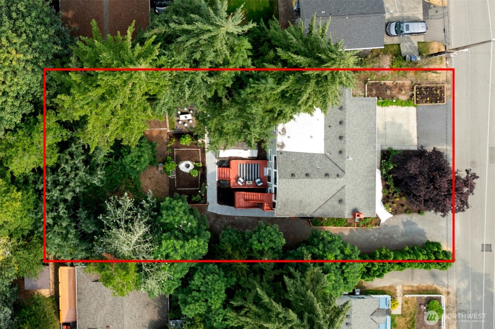 7331 151st Avenue Northeast, Unit B Redmond, WA 98052 - Photo 19 of 20 an aerial view of a house with a yard and garden