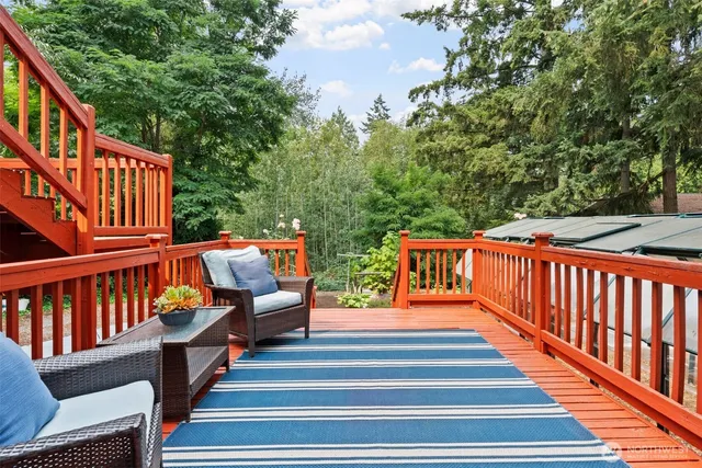 a balcony with outdoor seating