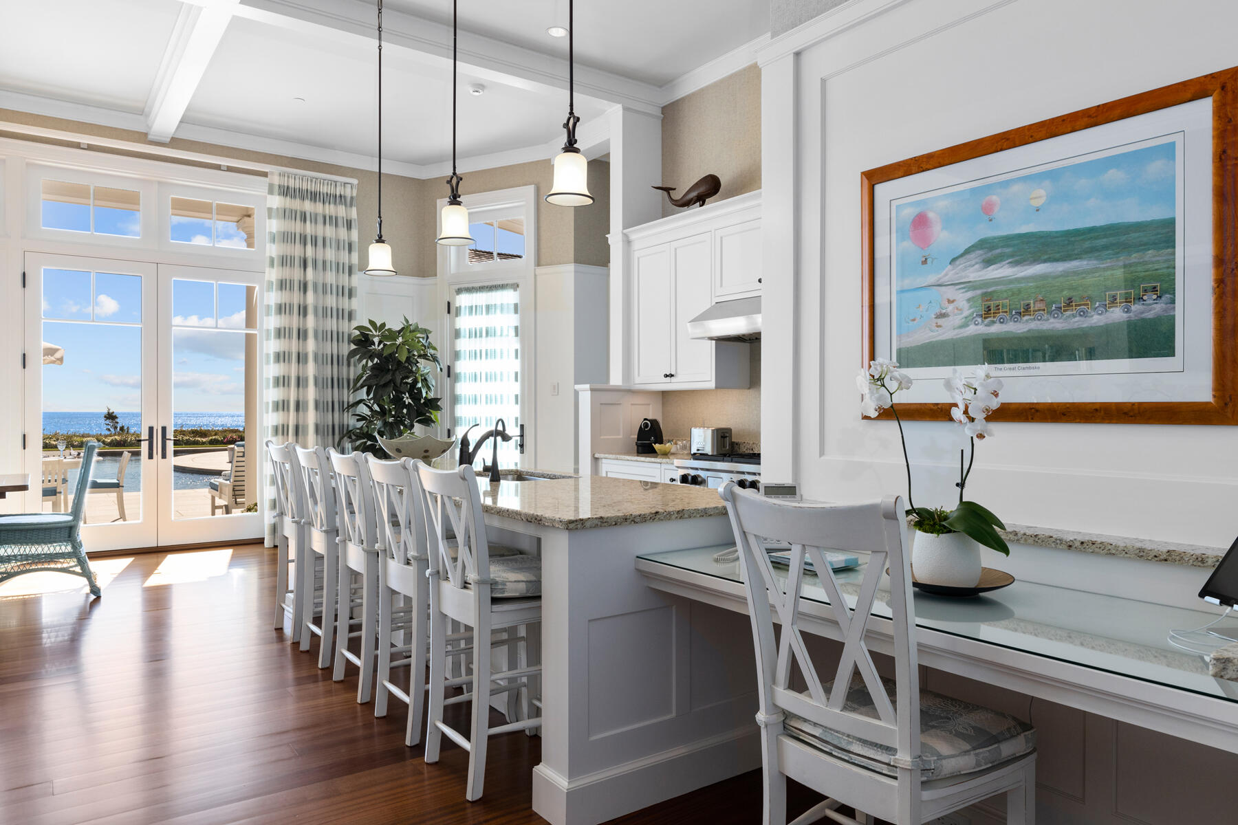 835 Sea View Avenue Osterville, MA 02655 - Photo 41 of 51 a dining room with furniture potted plants and wooden floor