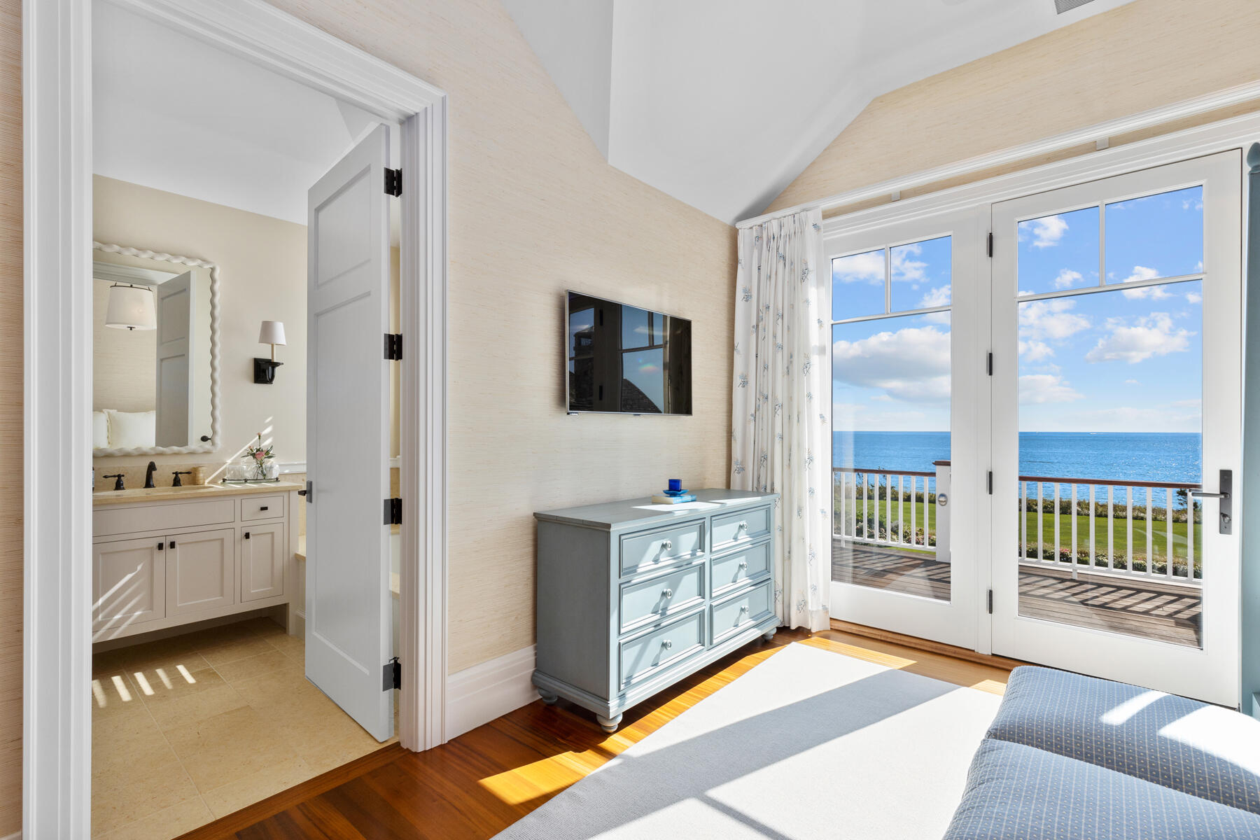 835 Sea View Avenue Osterville, MA 02655 - Photo 43 of 51 a spacious bedroom with a balcony a bed and a dresser