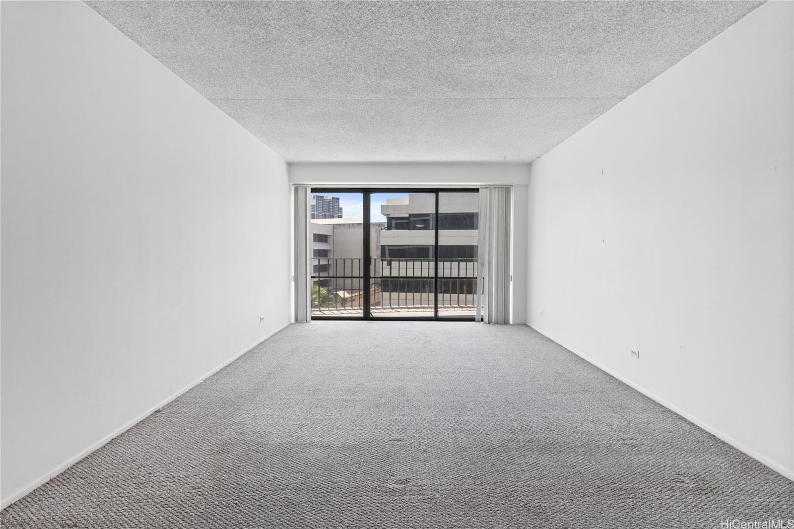 700 Richards Street, Unit 807 Honolulu, HI 96813 - Photo 7 of 15 an empty room with windows