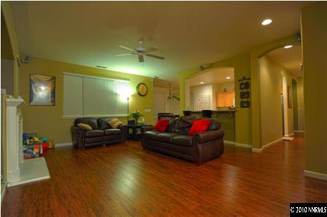 1730 Ornellaia Way Reno, NV 89521 - Photo 3 of 12 a living room with furniture and a wooden floor