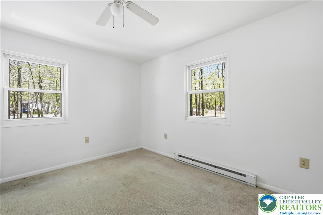 505 Chipmunk Road Bushkill, PA 18324 - Photo 14 of 46 an empty room with a window