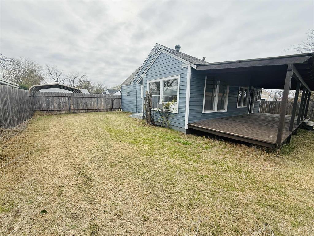 209 Hollywood Street Coleman, TX 76834 - Photo 3 of 19 a view of house with yard and entertaining space