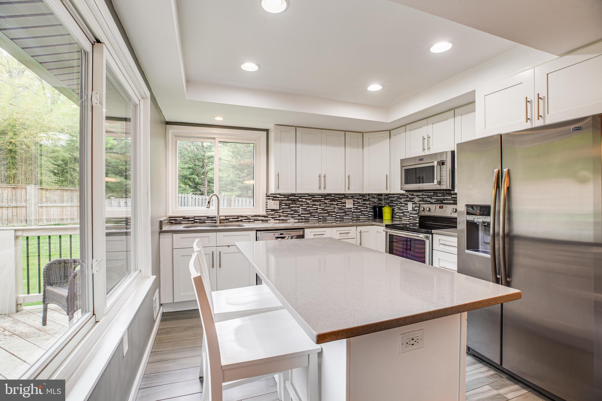 4442 Flintstone Road Alexandria, VA 22306 - Photo 13 of 38 Renovated kitchen with large granite island