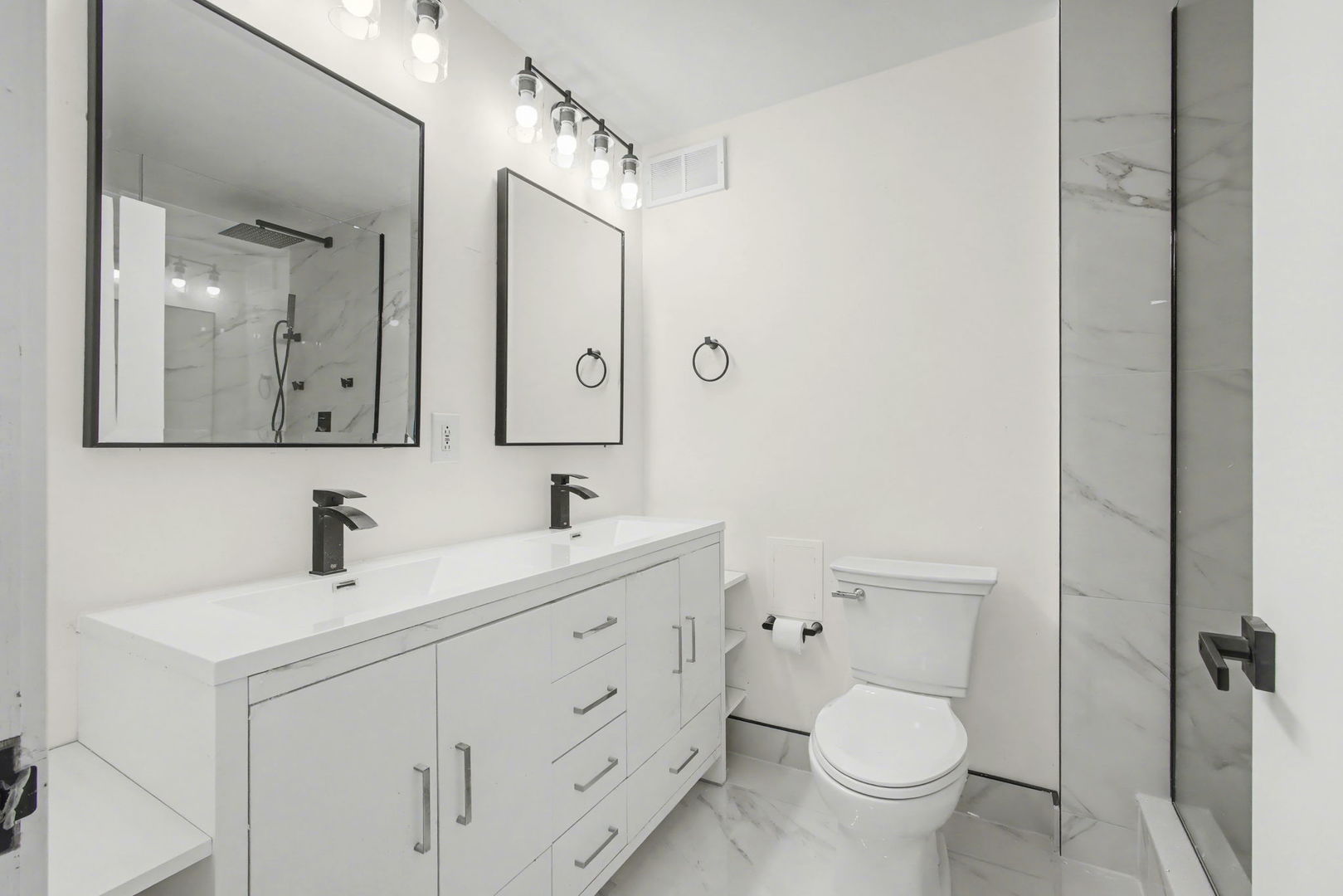 8801 West Golf Road, Unit 6E Niles, IL 60714 - Photo 11 of 15 a bathroom with a toilet sink and mirror