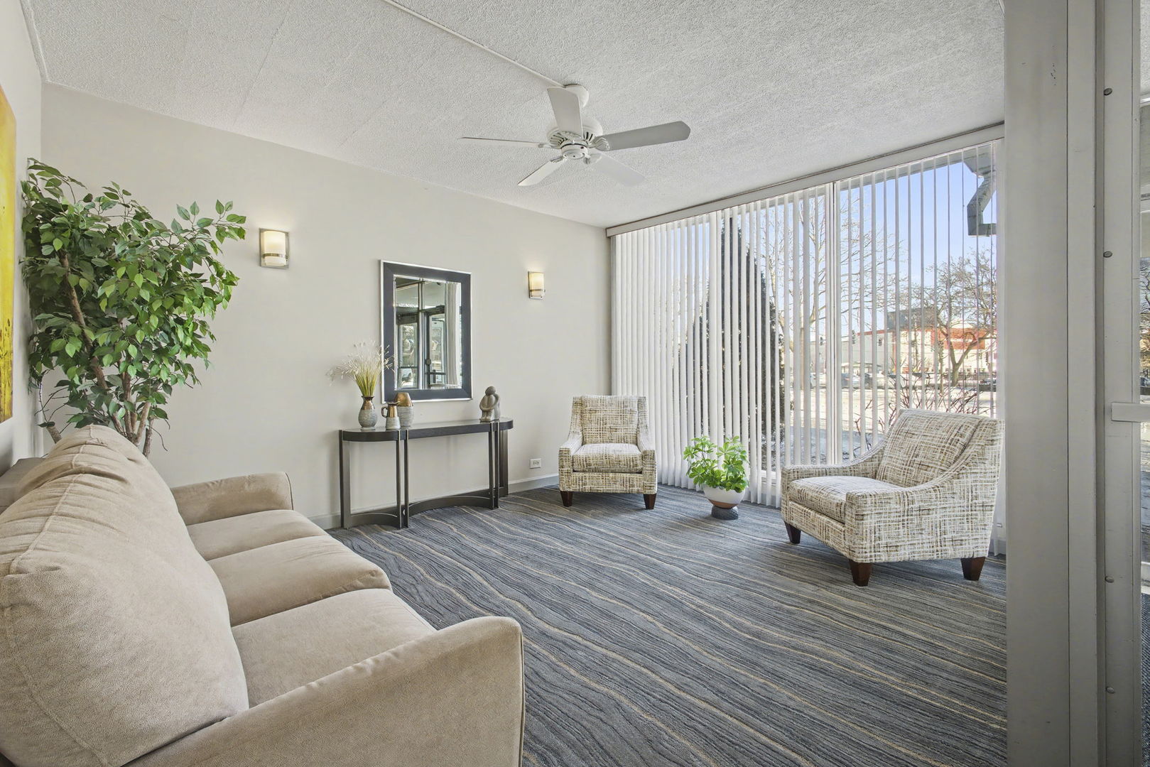8801 West Golf Road, Unit 6E Niles, IL 60714 - Photo 15 of 15 a living room with furniture and wooden floor