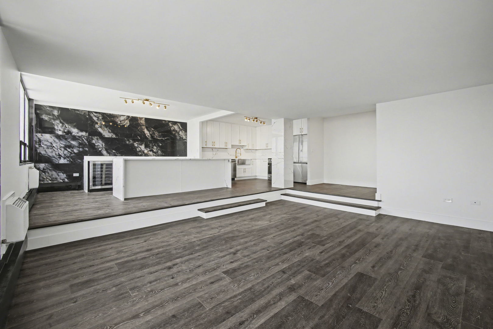 8801 West Golf Road, Unit 6E Niles, IL 60714 - Photo 5 of 15 a view of a kitchen with wooden floor and a sink