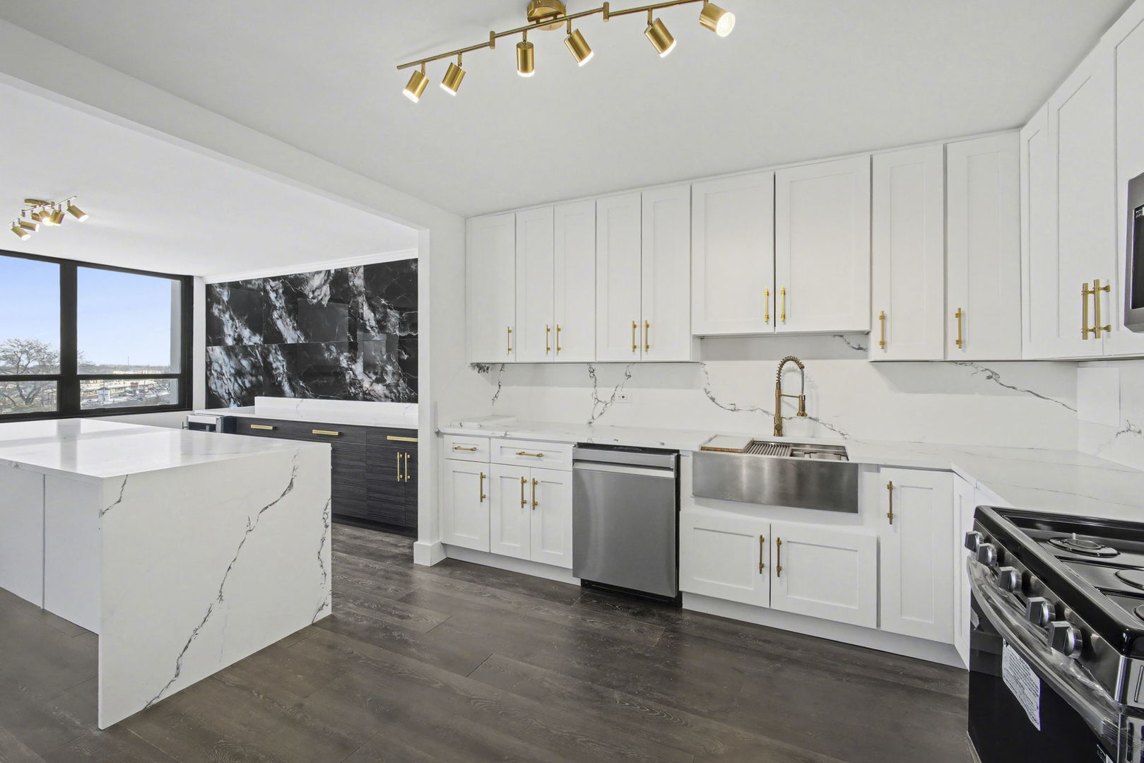 8801 West Golf Road, Unit 6E Niles, IL 60714 - Photo 9 of 15 a kitchen with granite countertop white cabinets and white appliances