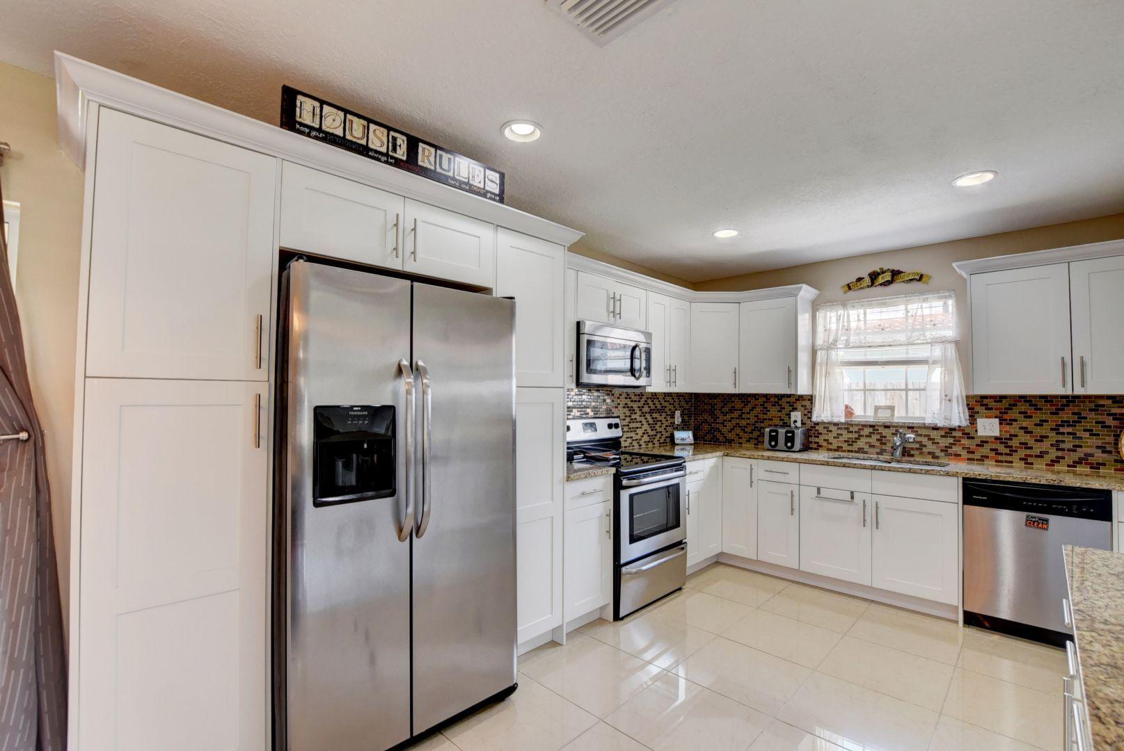 10900 Gantry Street Boca Raton, FL 33428 - Photo 19 of 26 Kitchen with refrigerator