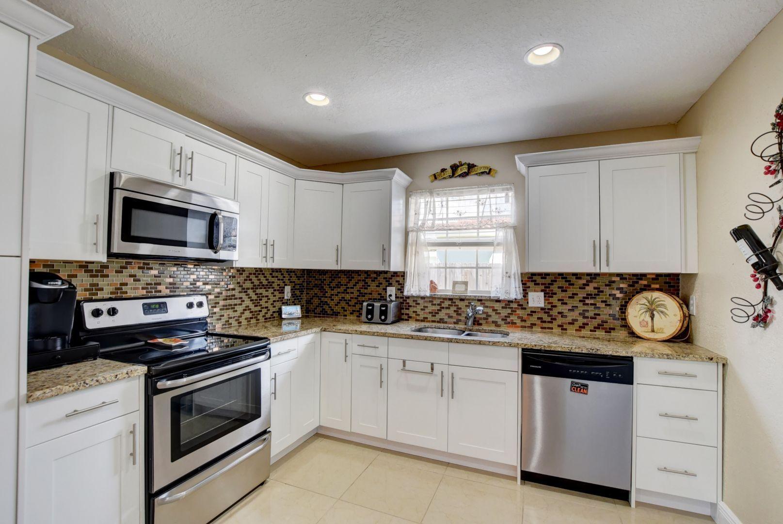10900 Gantry Street Boca Raton, FL 33428 - Photo 6 of 26 Kitchen with range