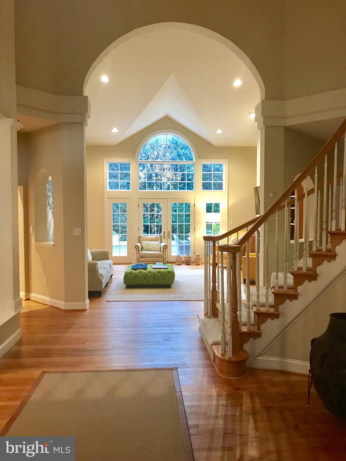 7405 Old Maple Square McLean, VA 22102 - Photo 2 of 25 Inviting Foyer with circular staircase