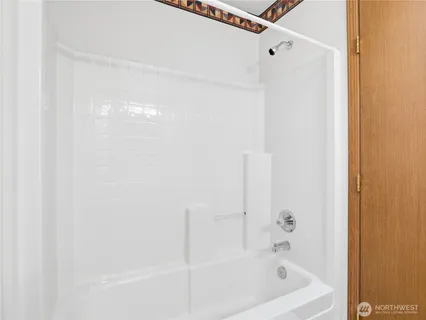 a bathroom with a bathtub