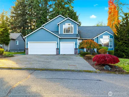 a front view of a house with yard