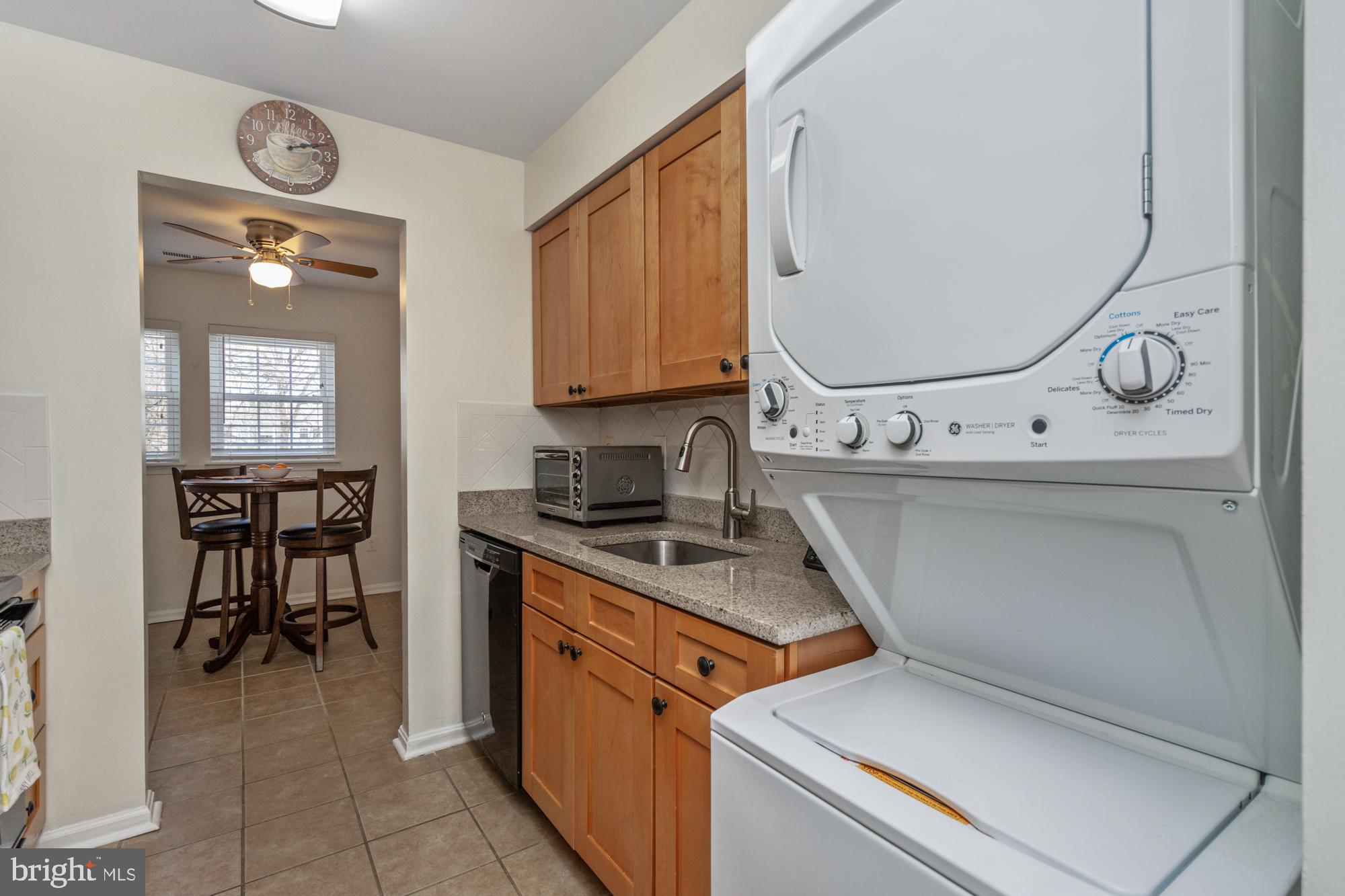 8489 Falls Run Road, Unit B Ellicott City, MD 21043 - Photo 12 of 41 a utility room with dryer and washer